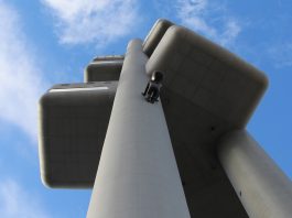 25 years of Zizkov TV Tower with Baby Crawling